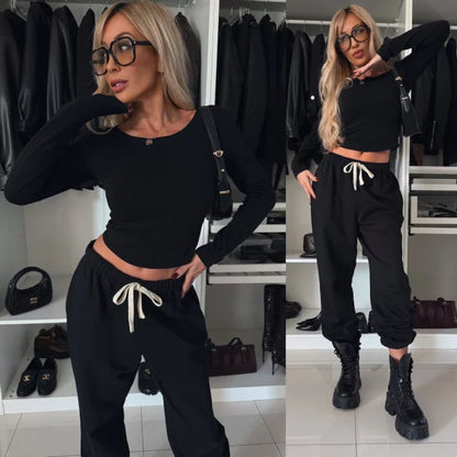 Women's lounge set with a comfortable long sleeve top and relaxed pants.