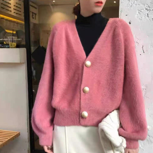 Ladies plush pullover with stylish button details Chic und Stil