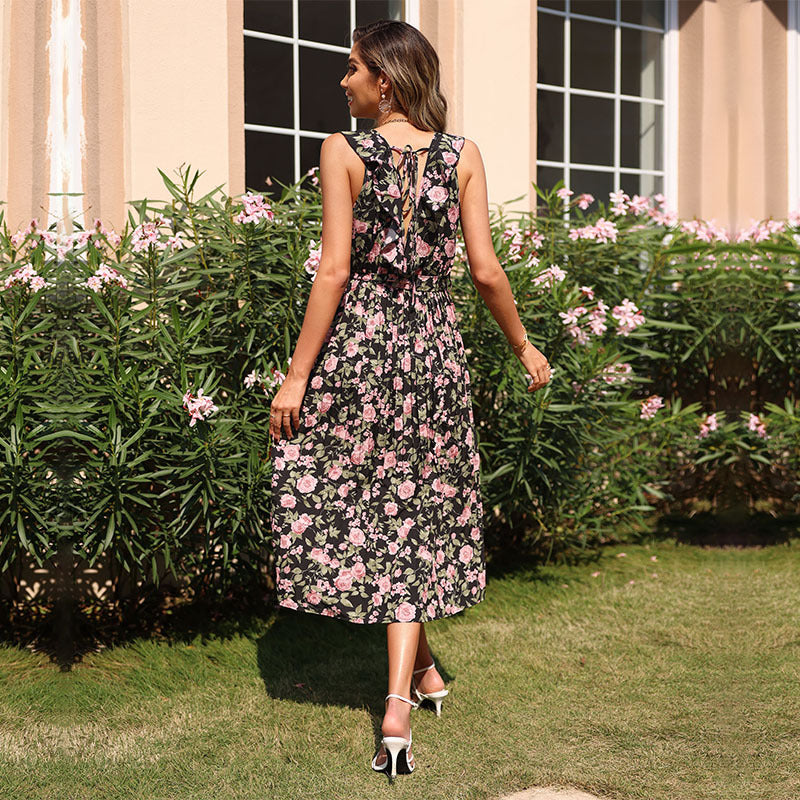 Robe maxi pour femmes avec motif floral et détail de bouton Chic und Stil