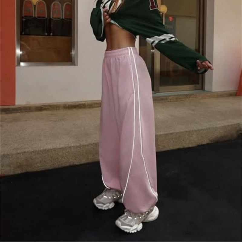 Casual sports pants for women with side stripes and practical pockets Chic and Style