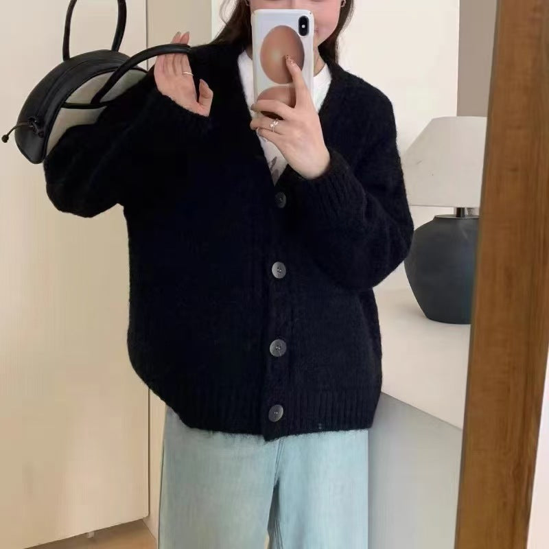 Dames Pull-over en tricot confortable avec un élégant décolleté en V et des détails de bouton Chic und Stil