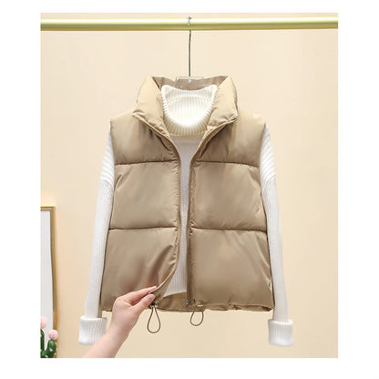 Dames gilet matelassé avec col haut et taille ajustable Chic und Stil