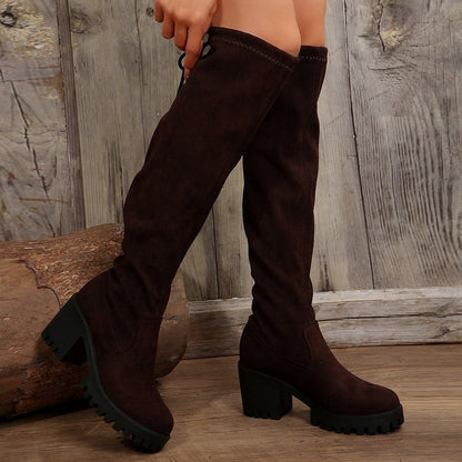 Bottes au-dessus du genou pour femmes avec un motif léopard à la mode et un talon bloc robuste Chic und Stil