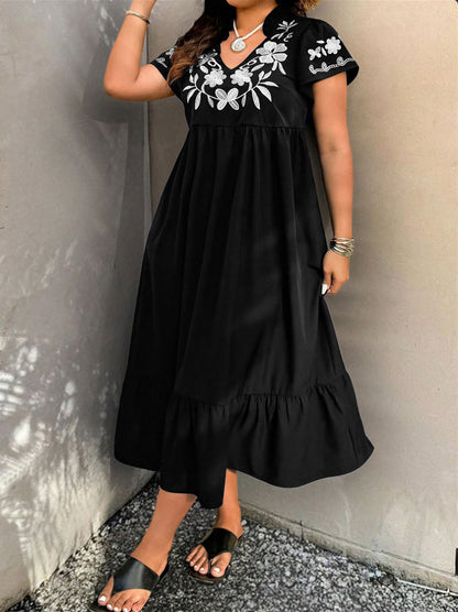 Robe maxi pour femmes avec design floral brodé et jupe volumineuse Chic und Stil