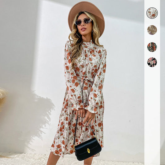 Robe midi pour dames avec motifs floraux et ceinture ajustable Chic und Stil