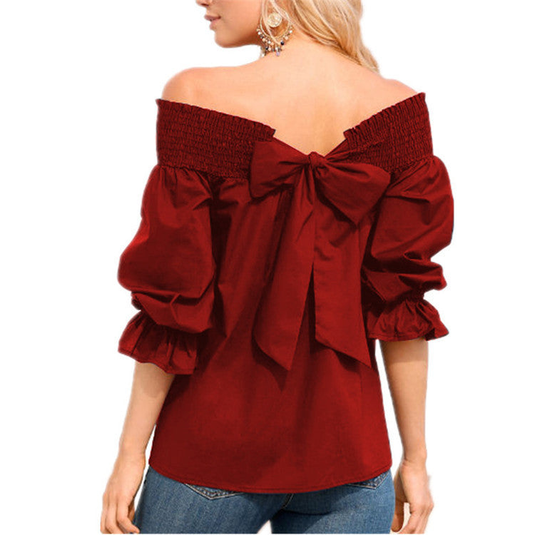 Blouse off-shoulder pour dames avec manches à volants et détail en nœud Chic und Stil