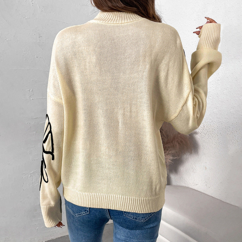 Pull-over en tricot pour femmes avec design floral et col montant Chic und Stil