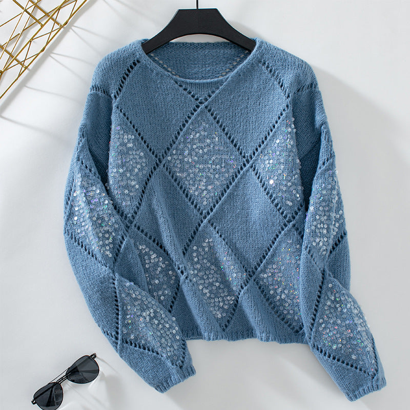Pull femme à la mode avec un design tricoté élaboré et des éléments scintillants Chic und Stil