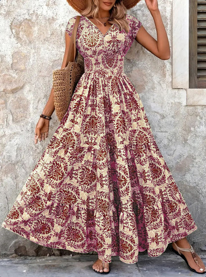 Robe maxi à fleurs pour femmes avec décolleté en V et ourlet à volants Chic und Stil