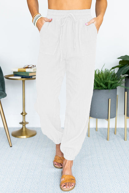 Casual women's pants with elastic waistband and practical pockets Chic and Style