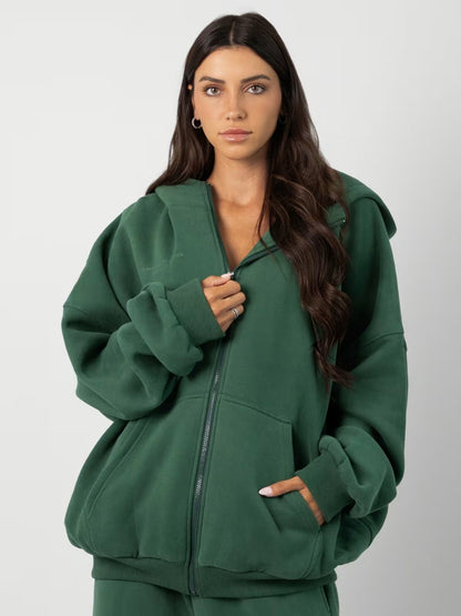 Femmes pull à capuche oversized à la mode avec pantalon de jogging assorti Chic und Stil