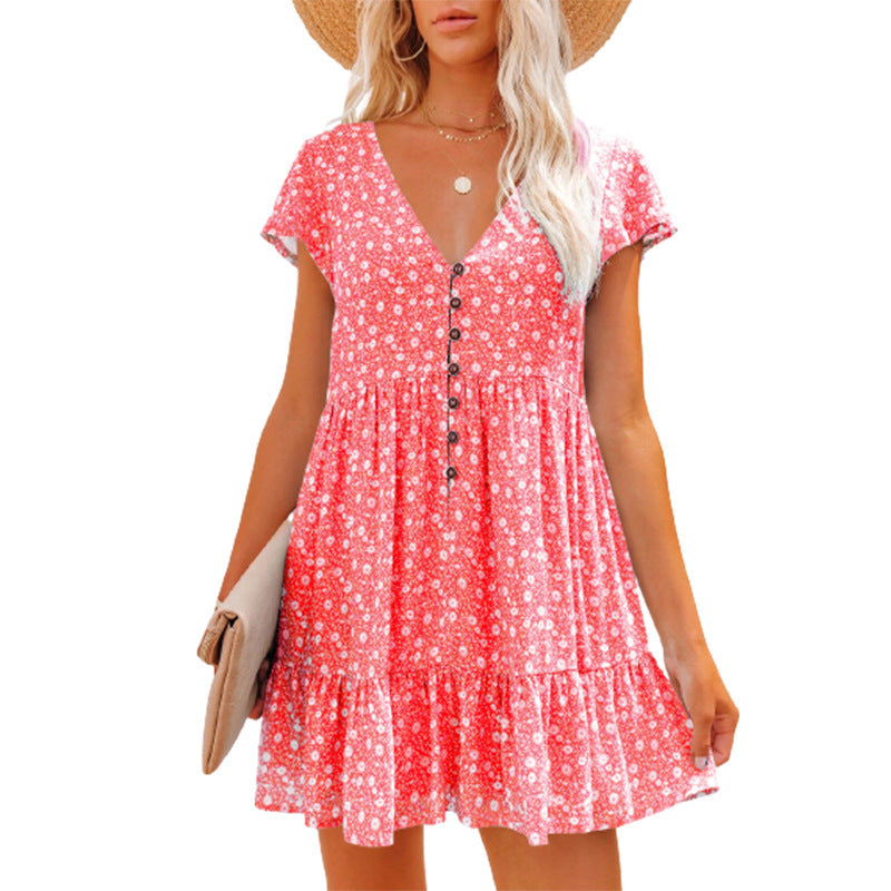 Robe d'été pour femmes avec des motifs floraux et des détails de boutons Chic und Stil