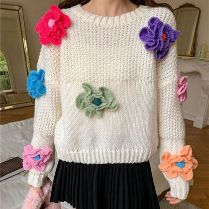 Femme Pull en tricot ludique avec des applications florales Chic und Stil