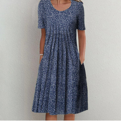 Robe midi femme à fleurs avec design plissé Chic und Stil