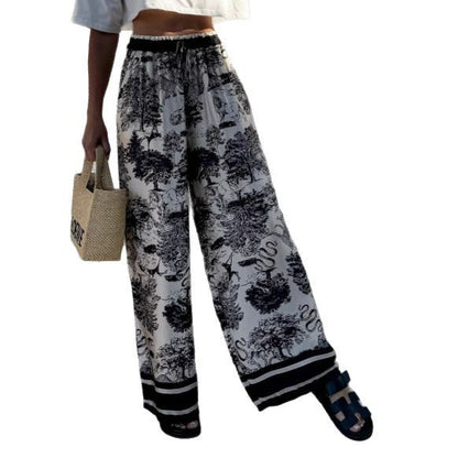 Wide palazzo pants for Damen with floral pattern and elastic waistband Chic and Style