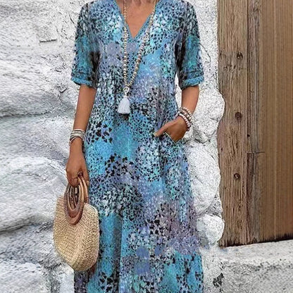 Robe maxi femme avec décolleté en V et poches latérales pratiques Chic und Stil