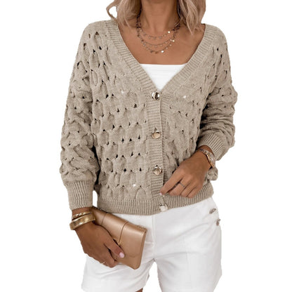 Veste en tricot pour femmes avec une structure en mailles aérées et des détails de boutons élégants Chic und Stil