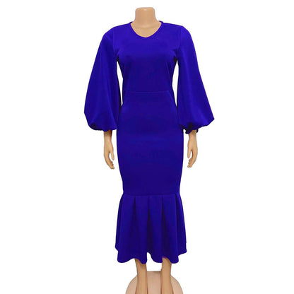 Robe ajustée pour femmes avec des manches volumineuses et un ourlet flottant Chic und Stil