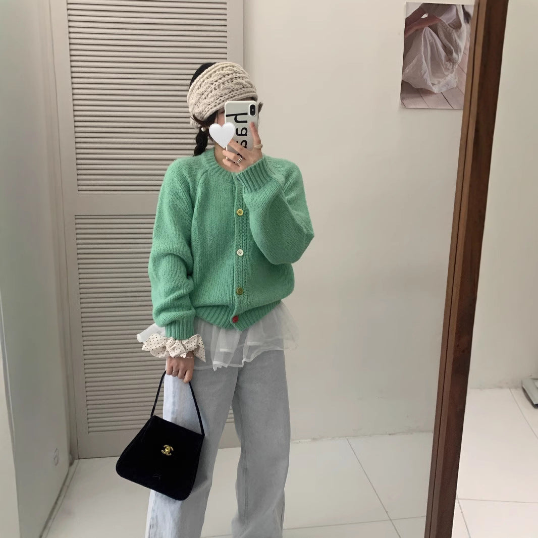 Dames Pull-over douillet avec des boutons colorés et coupe décontractée Chic und Stil