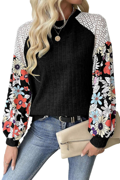 Pull femme à la forme ludique avec un design de manches florales Chic und Stil