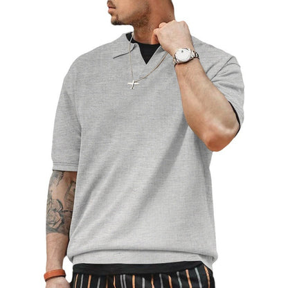 Polo décontracté pour hommes à manches courtes avec design texturé et col à la mode Chic und Stil