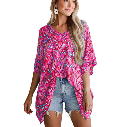 Blouse de plage décontractée pour femmes avec coupe asymétrique et motif coloré Chic und Stil