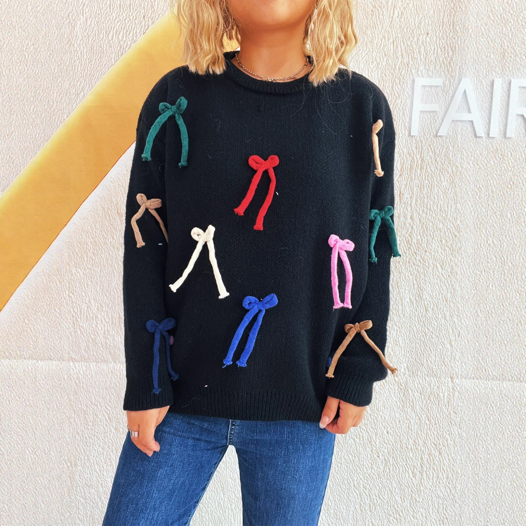 Pull créatif pour femmes avec des accents de nœuds colorés Chic und Stil