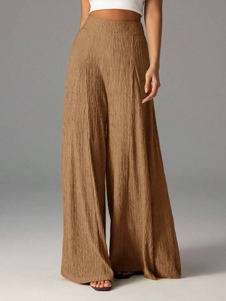 Wide pleated pants for women with high waist and elastic waistband Chic and Style