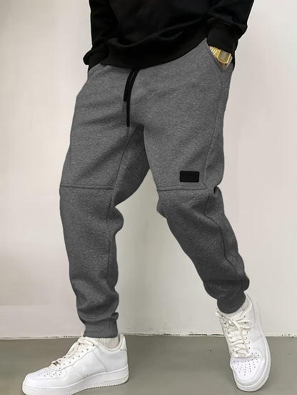 Pantalon de jogging décontracté pour hommes avec taille élastique et poches latérales Chic und Stil