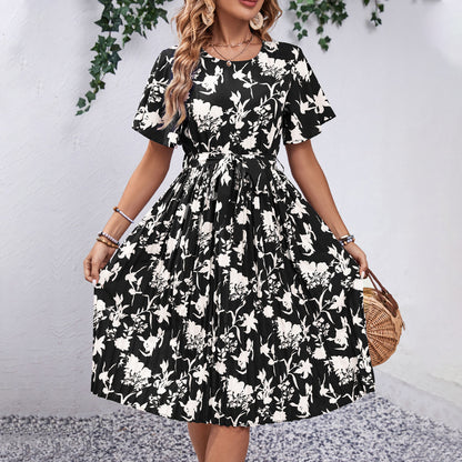 Robe midi à imprimé floral pour dames avec ceinture à nouer Chic und Stil