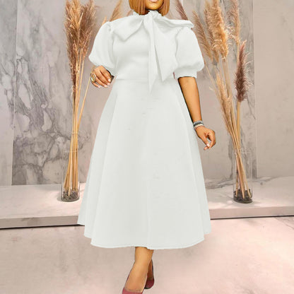 Robe midi femme avec col à nœud Chic und Stil