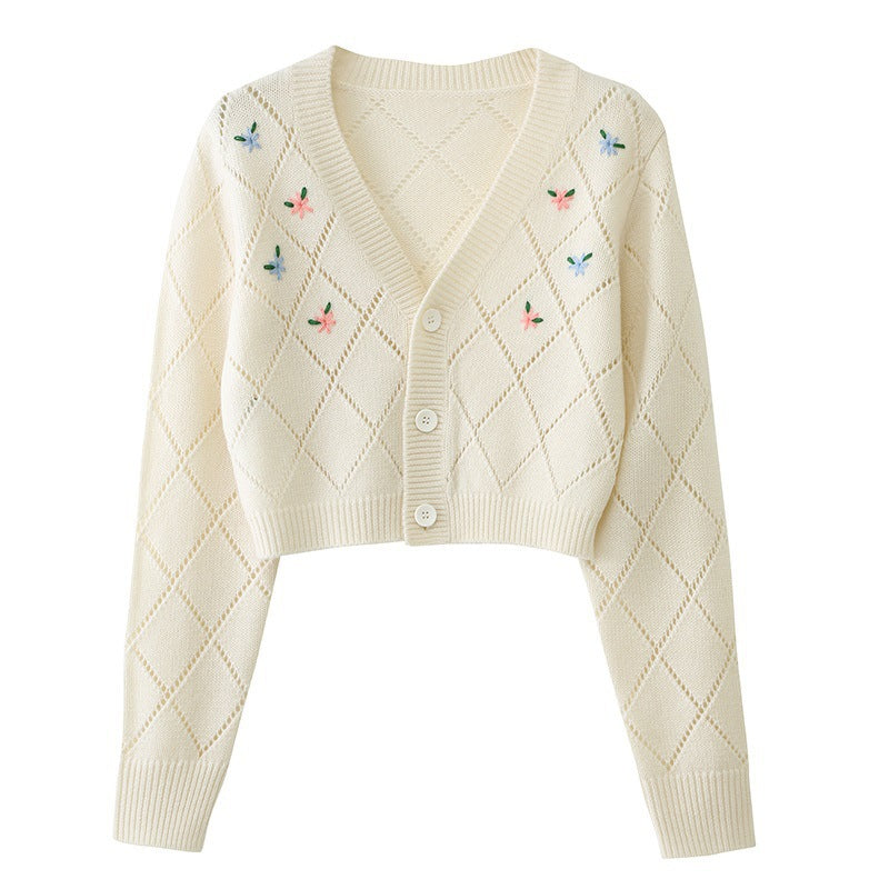 Dames cardigan ludique avec motif floral en losanges et détail boutons Chic und Stil