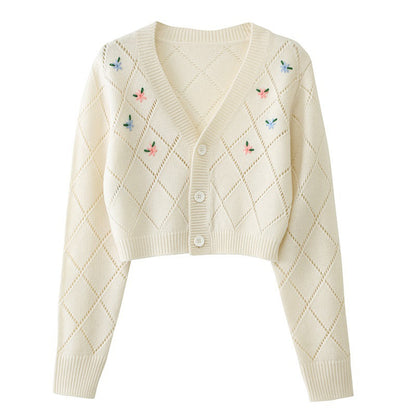 Dames cardigan ludique avec motif floral en losanges et détail boutons Chic und Stil