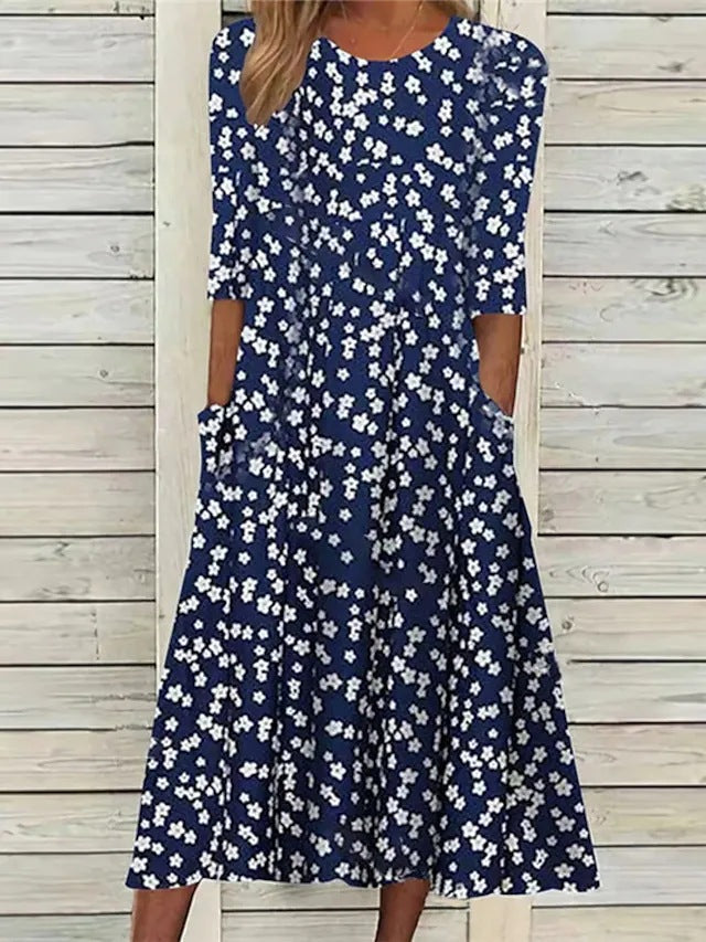Robe midi élégante pour dames avec design floral et poches Chic und Stil