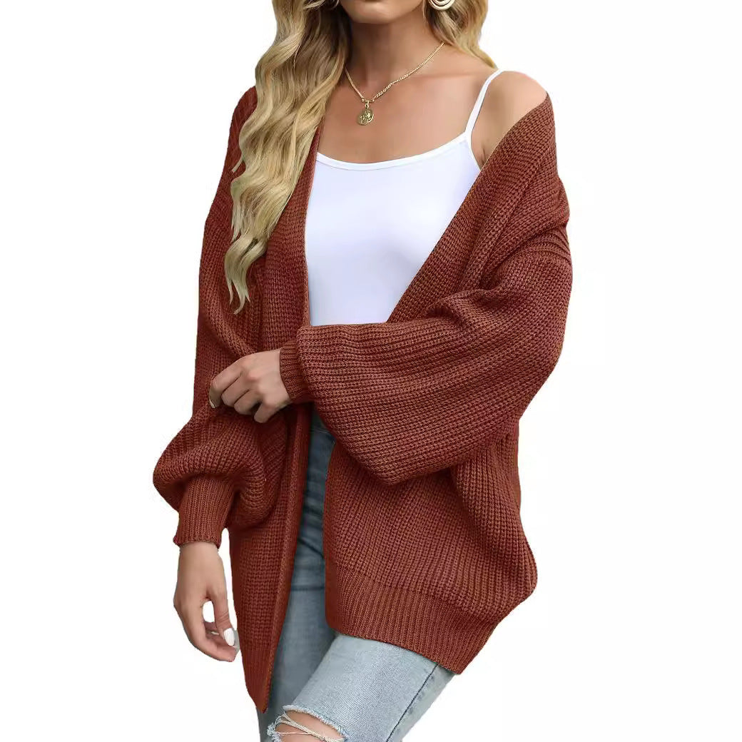 Dames Cardigan en gros tricot délicat avec des manches chatoyantes Chic und Stil