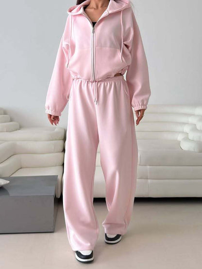 Fashionable women's hoodie with a short cut and matching jogger pants Chic and Style