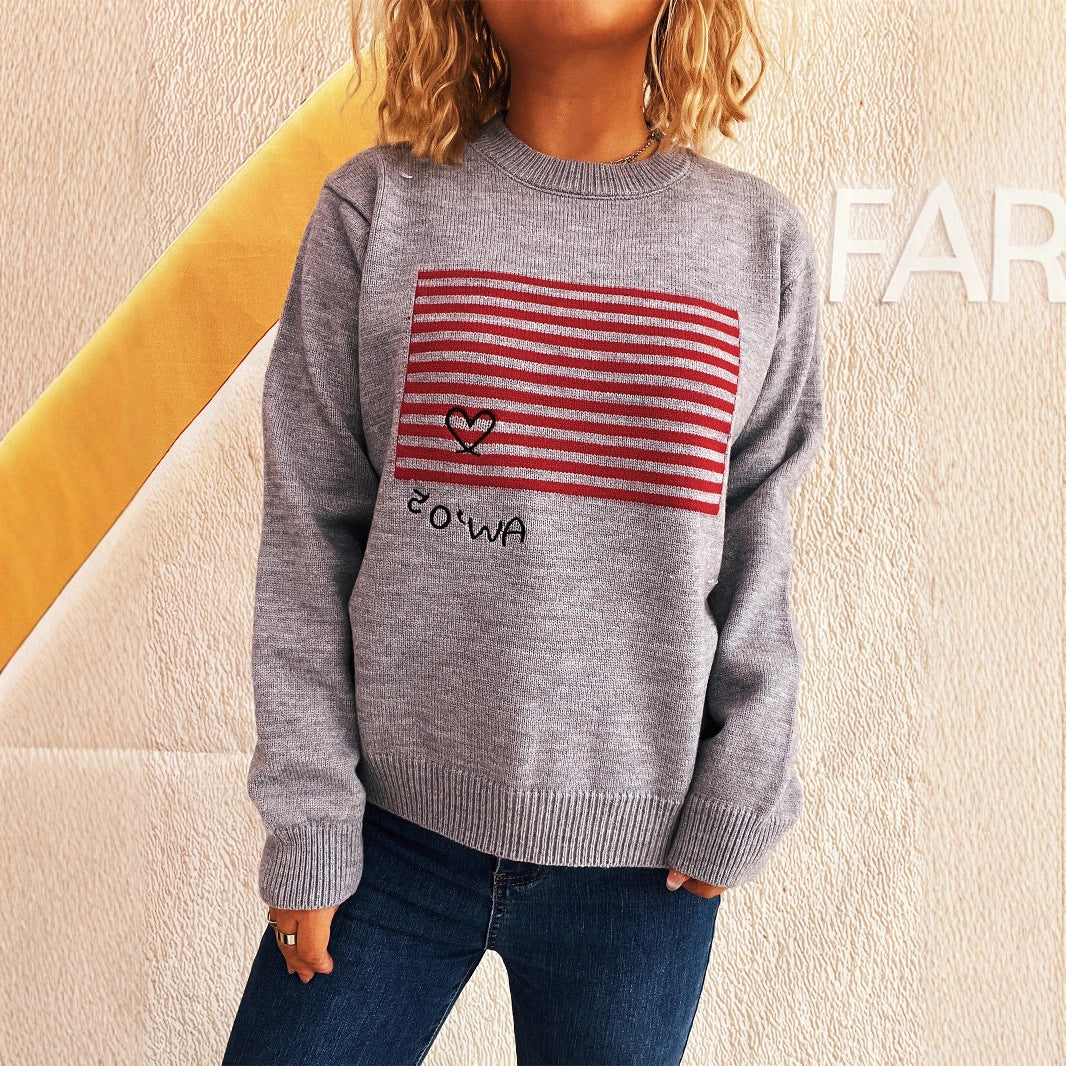 Pull décontracté pour femmes avec design rayé et application en forme de cœur Chic und Stil