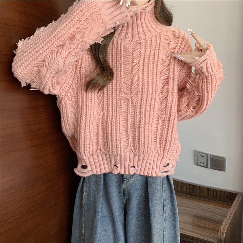 Pull féminin tendance avec motif en tricot structuré et col montant Chic und Stil