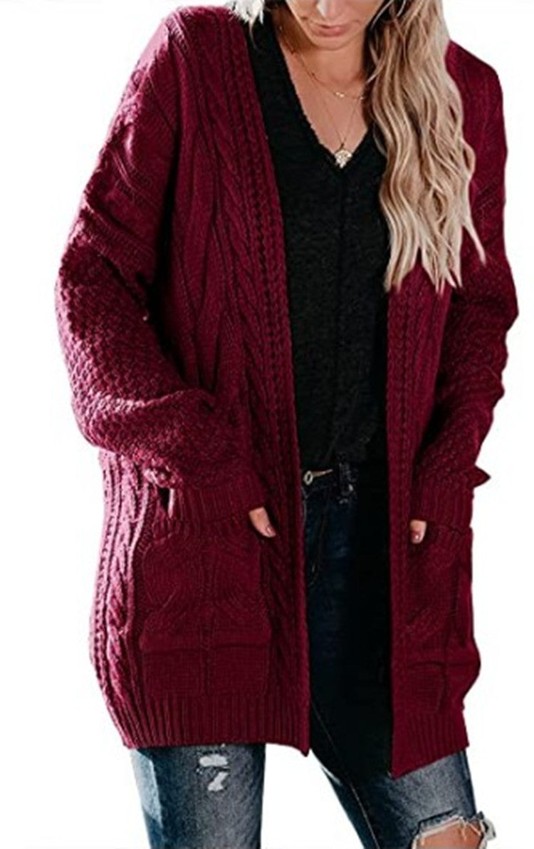 Dames grosse tricot cardigan avec une structure en torsades frappante et des poches pratiques Chic und Stil