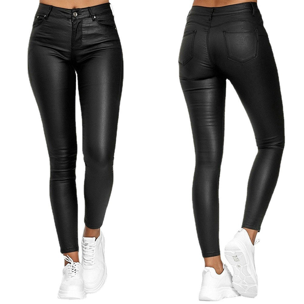 Fitted women's pants in faux leather with a high waist and side pockets Chic and Style