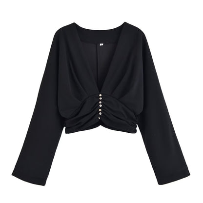 Dames haut élégant avec décolleté en V profond et design de ruché raffiné Chic und Stil