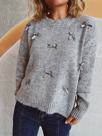 Pull en tricot pour femmes avec des accents de nœuds ludiques Chic und Stil