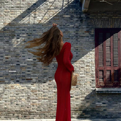 Robe maxi en tricot pour femmes avec un motif ajouré raffiné et un profond décolleté en V Chic und Stil