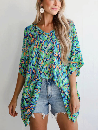 Blouse de plage décontractée pour femmes avec coupe asymétrique et motif coloré Chic und Stil