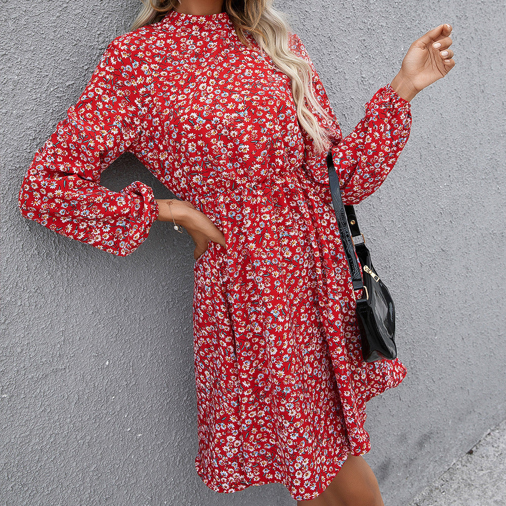 Robe mi-longue florale pour femmes avec col montant et ceinture à la taille Chic und Stil
