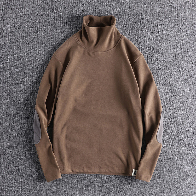 Pull en polaire à col montant pour hommes avec des coudières contrastantes Chic und Stil