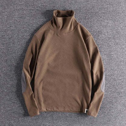 Pull en polaire à col montant pour hommes avec des coudières contrastantes Chic und Stil