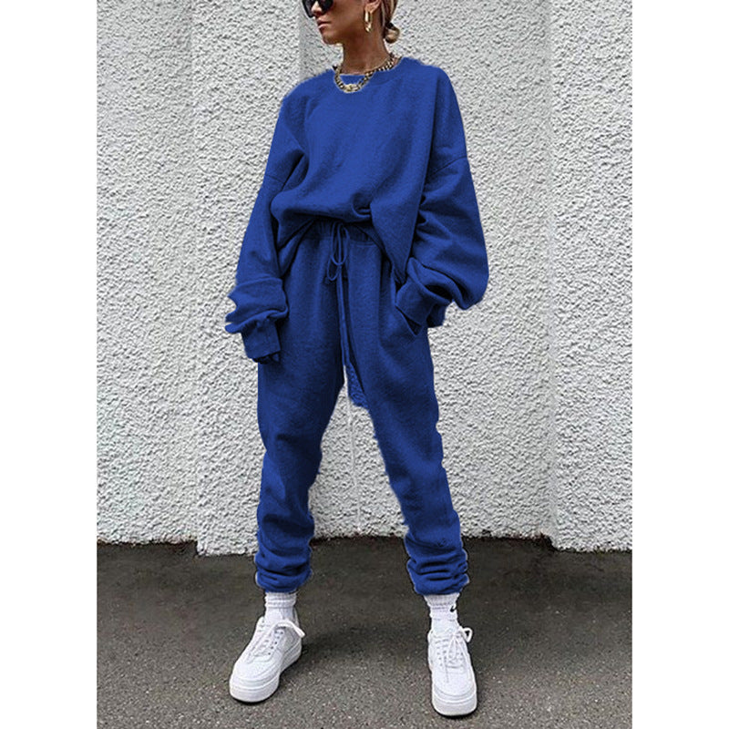 Women casual and comfortable leisure set with an oversized sweater and chic jogging pants and style