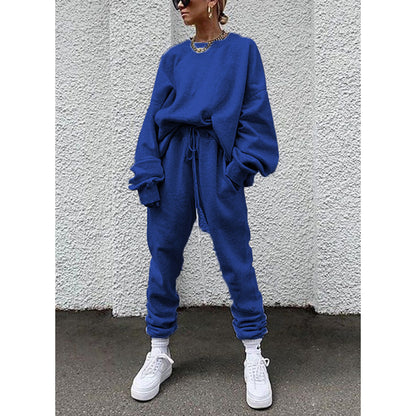 Women casual and comfortable leisure set with an oversized sweater and chic jogging pants and style