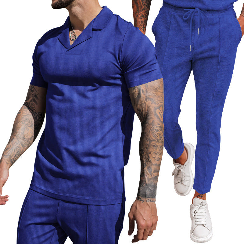 Elegant men's short sleeve polo with textured design and matching slim-fit trousers Chic and Style